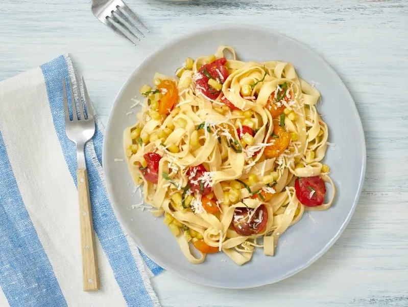 Tagliatelle with corn and cherry tomatoes recipe