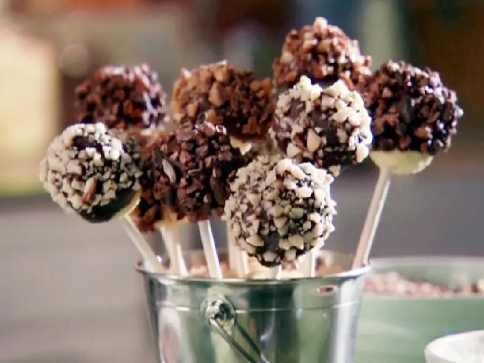 No recipe recipe: chocolate-dipped cheesecake lollipops recipe | aida mollenkamp | food network