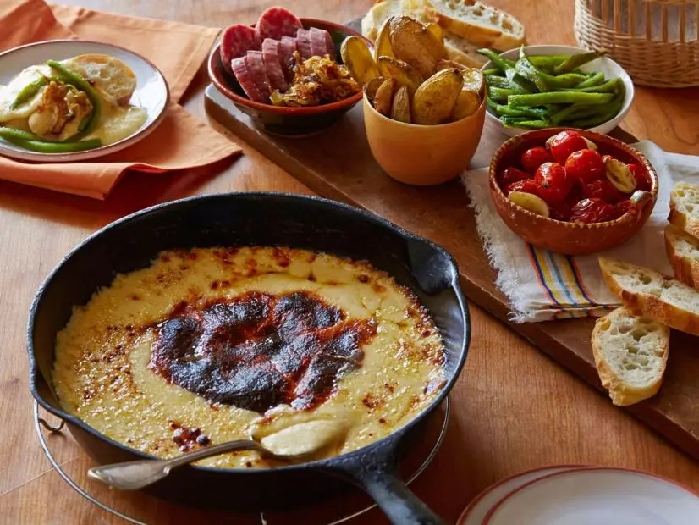 Queso fundido with charred poblanos and sides recipe