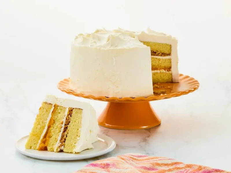Vanilla cake with mango passion fruit jam and coconut rum buttercream recipe