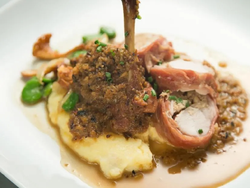 Rabbit with spring vegetable ragu and polenta recipe | anne burrell | food network
