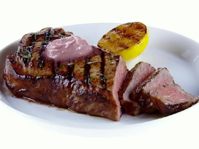 Ny strip steak with red wine-rosemary butter recipe | giada de laurentiis | food network