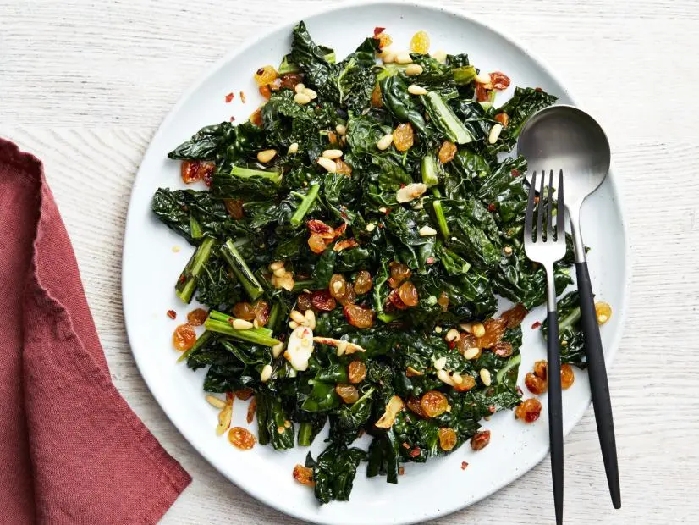 Kale with golden raisins and pine nuts recipe