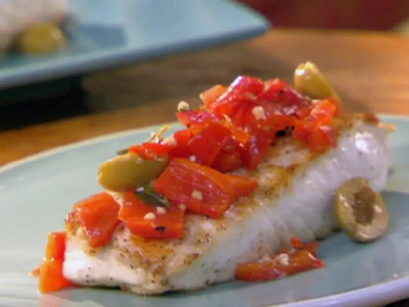 Halibut with anchovy-stuffed olives, red peppers and oregano recipe