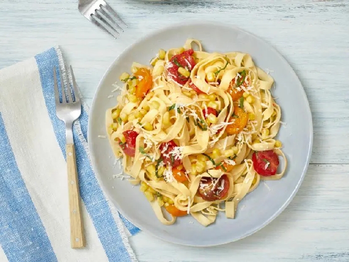Tagliatelle with corn and cherry tomatoes recipe