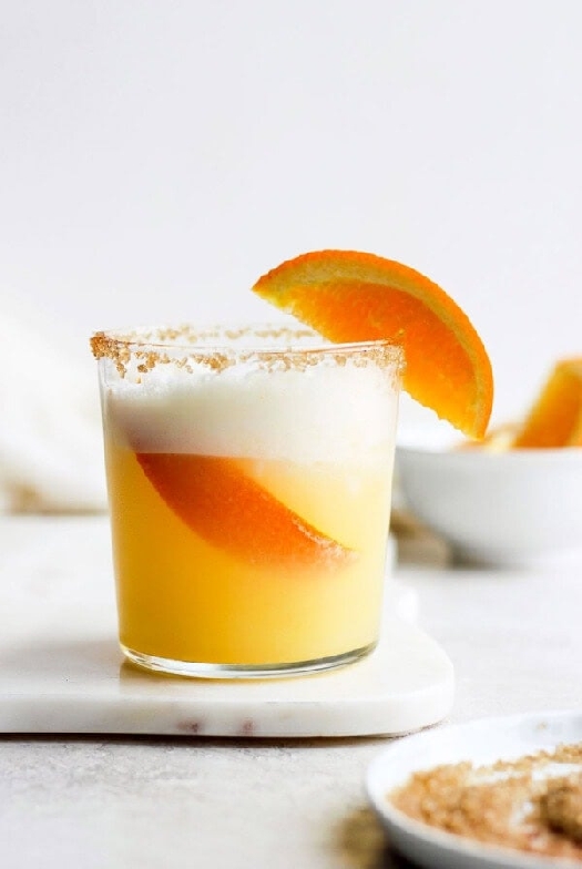 Frothy orange creamsicle cocktail