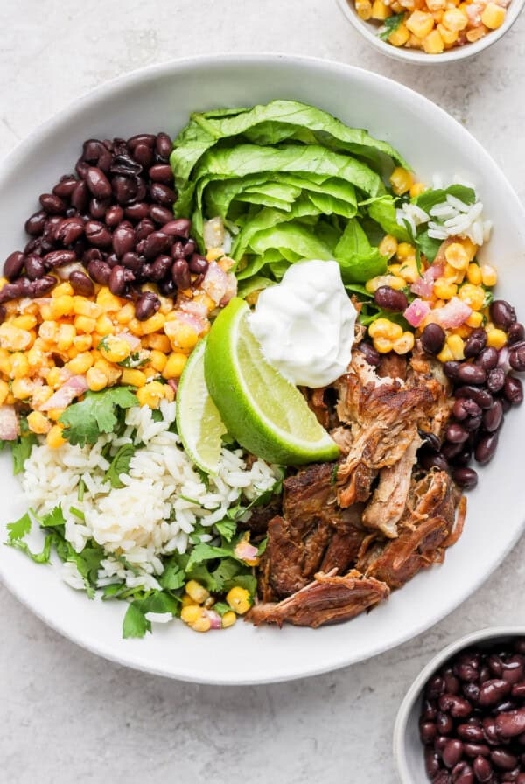 Slow cooker carnitas burrito bowls