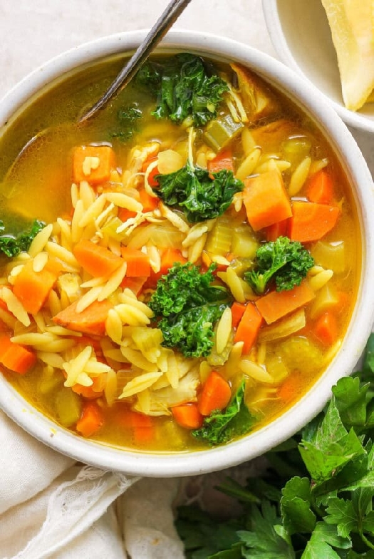 Golden chicken orzo soup