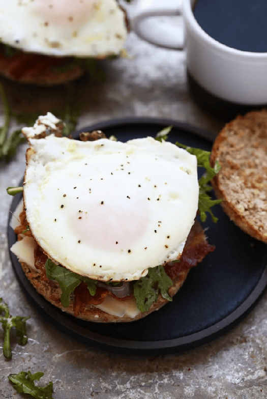 Arugula breakfast sandwich with caramelized onions