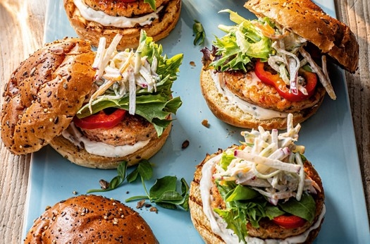 Spicy salmon burgers with sour cream slaw