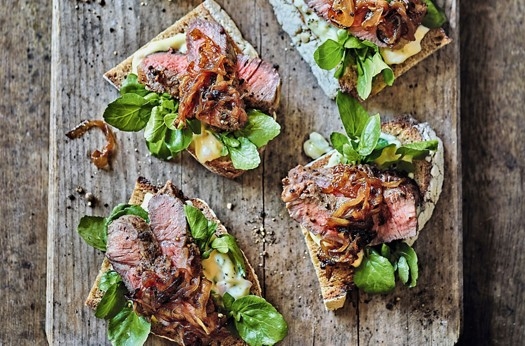 Open steak sandwiches with dark fried onions and béarnaise mayonnaise