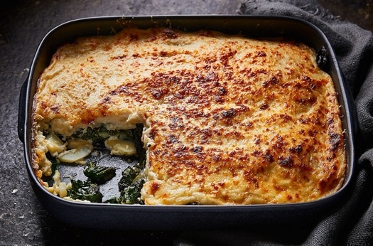 Maris piper & winter greens gratin