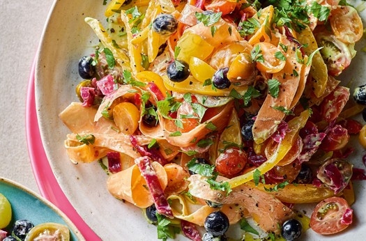 Raw rainbow salad with toasted pitta chips