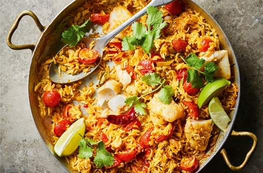 Tomato & coconut pilau with steamed white fish