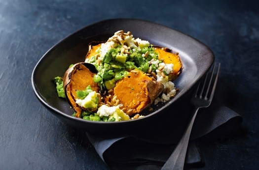 Baked sweet potatoes with smashed avocado
