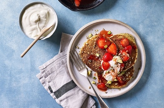 Gluten-free pistachio pancakes with vanilla-cardamom strawberries
