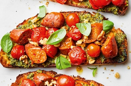 Sausage, tomato & walnut pesto on toast