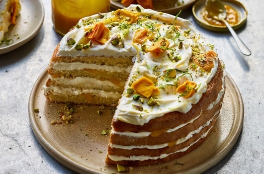 Midsummer mango & passion fruit layer cake with lime and pistachio
