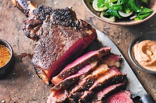 Tomahawk steak with spicy dipping sauce