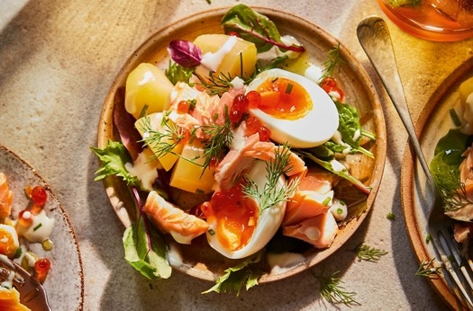 Hot smoked salmon, potato & salmon caviar salad with buttermilk dressing