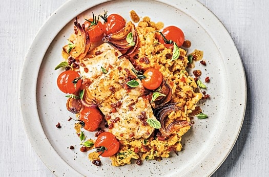 Chorizo baked haddock, cherry tomatoes & chickpea purée