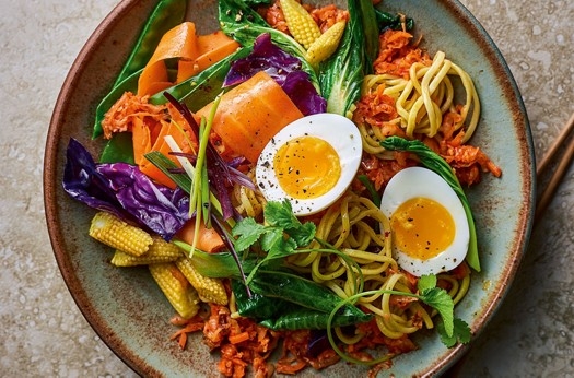 Fiery kimchi noodle stir fry with soft-boiled eggs