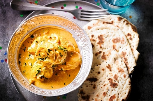 Creamy butter chicken with black mustard naans