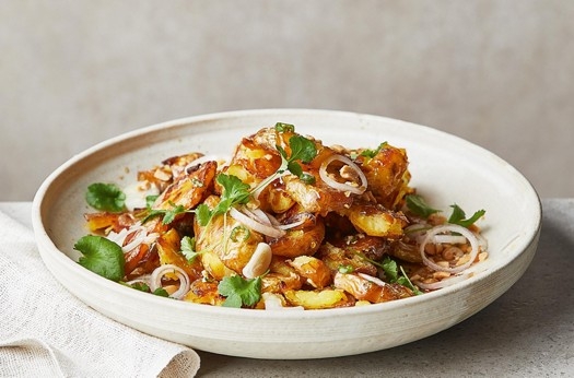 Thai-style smashed potatoes with chilli dressing