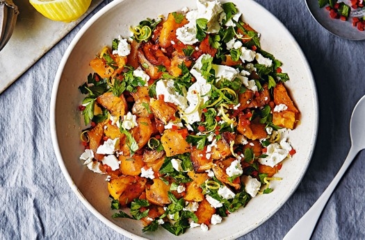 Smashed swede with feta, chilli and parsley