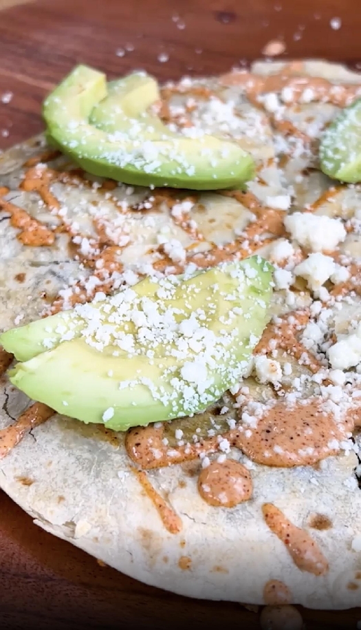 Poblano black bean quesadilla with spicy crema