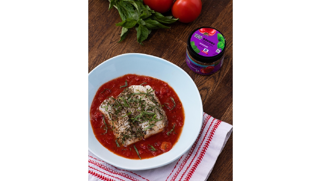 Savoury white fish with simmered tomatoes