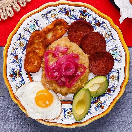 Mangú con los tres golpes
