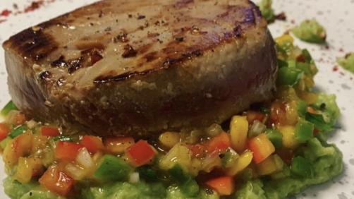 Seared ahi tuna steak with mango salsa and wasabi-avocado cream